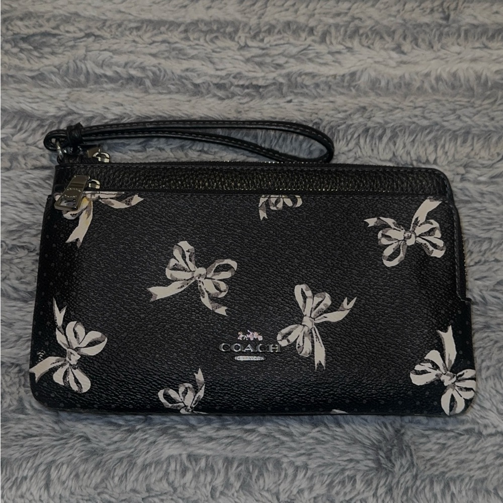 Coach Black Wristlet with White Bow Accents